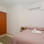Apartamento Mirante Astúrias - varanda gourmet de frente para a praia da Astúrias no Guarujá